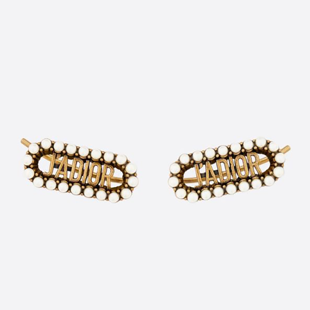 Close-up of Dior Women J Adior Earrings antique gold metal and pearls