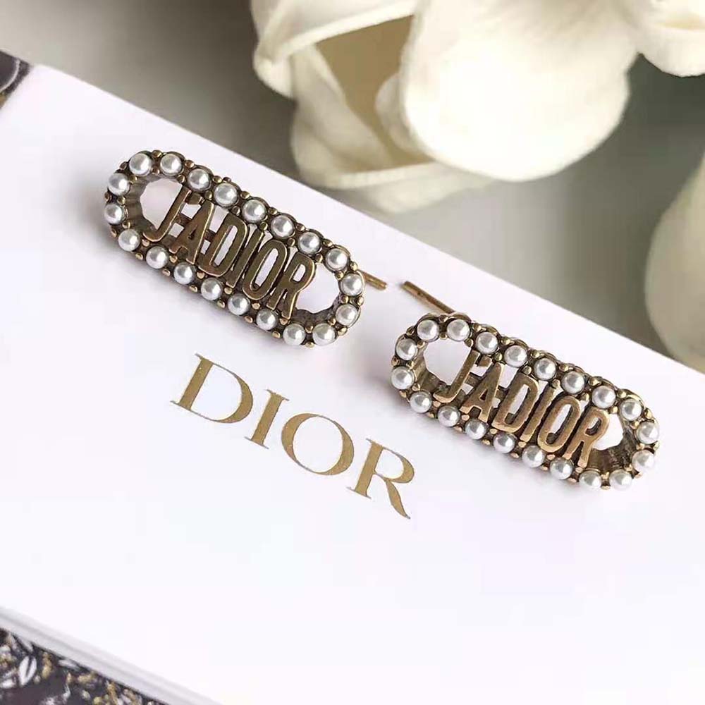 Side profile showing drop length of Dior Women J Adior Earrings