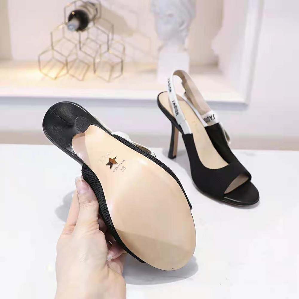 Overhead view showing slender heel and adjustable buckle of Dior J’adior sandal