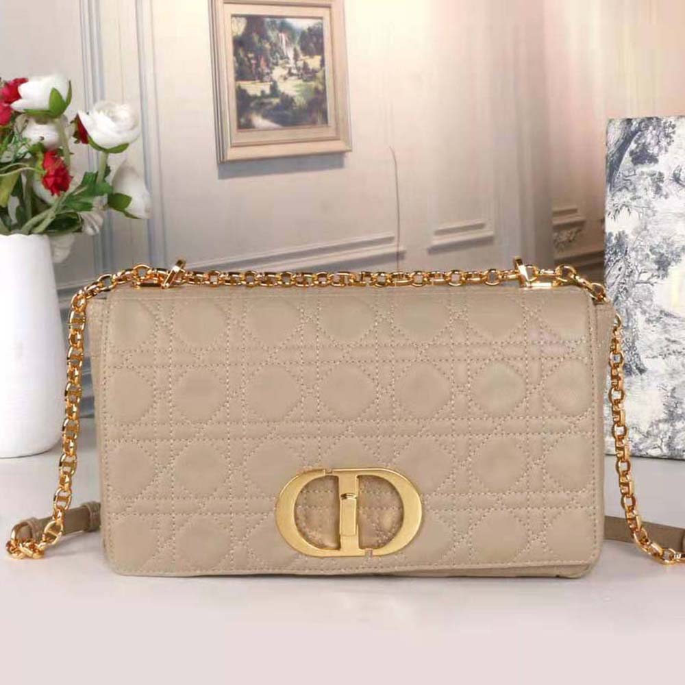 Close-up of gold-tone Cannage hardware on Dior Women Large Dior Caro Bag