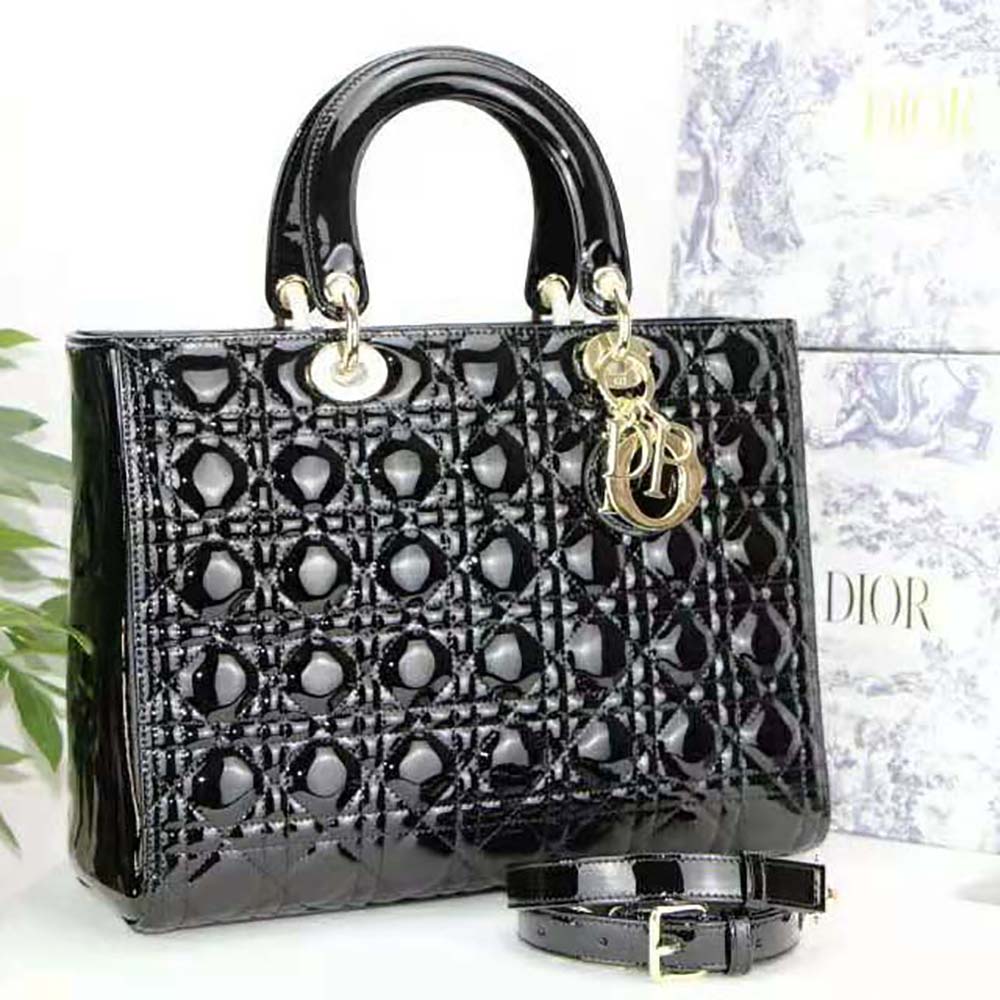 Close-up of patent Cannage quilting and silver hardware on Lady Dior bag