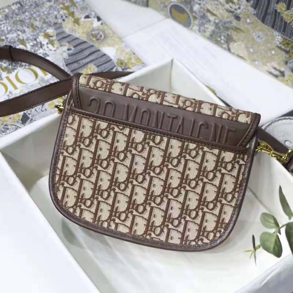 Side profile showing structured silhouette of Dior Women Medium Dior Bobby Bag