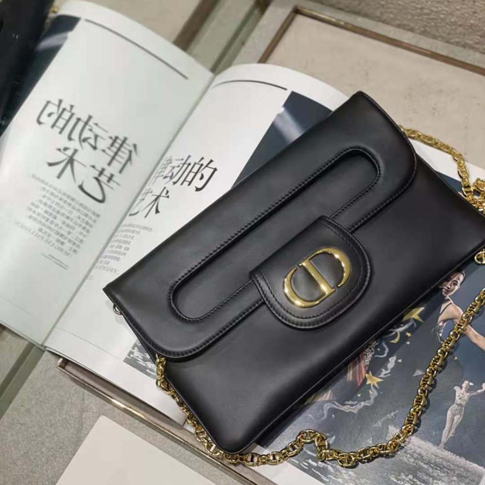 Side angle showing double straps on Dior Women Medium Diordouble Bag