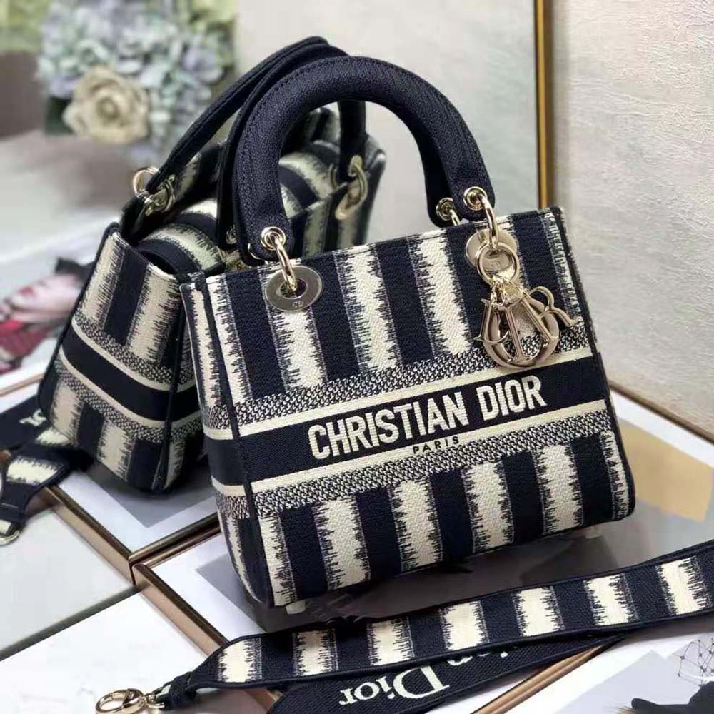 Side view showing silver-tone hardware on Dior Women Medium Lady D-lite Bag
