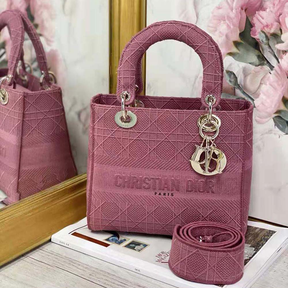 Side angle showing structured silhouette of Dior Women Medium Lady D-lite Bag