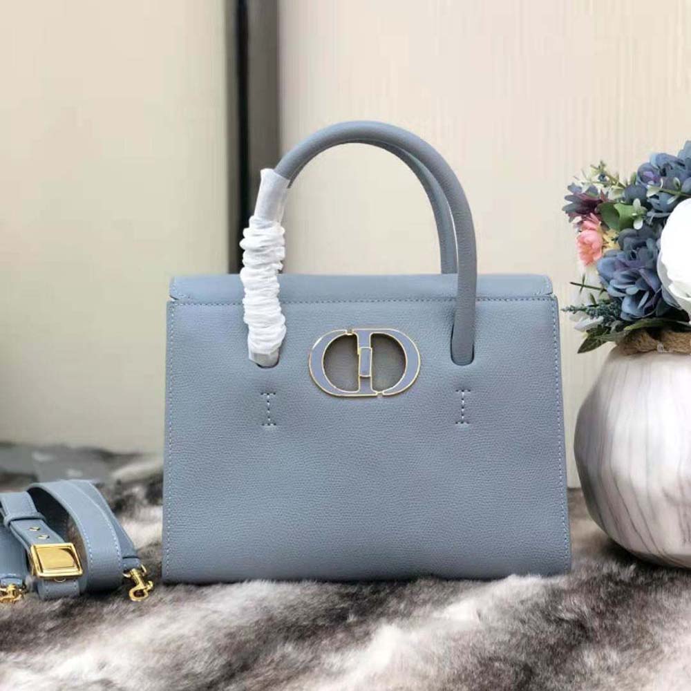 Close-up on silver-tone hardware detail of Dior Women Medium ST Honore Tote