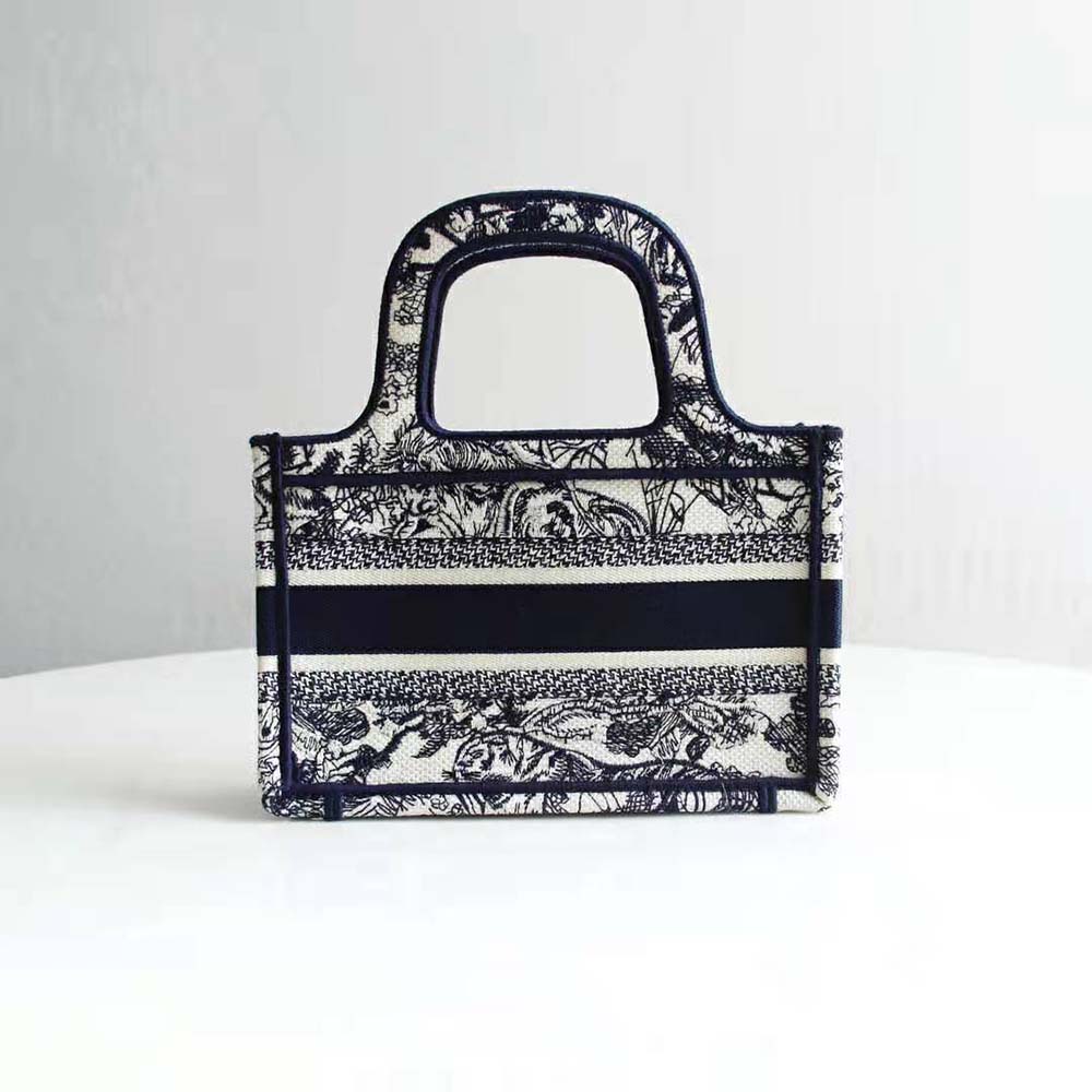 Side profile showing silver hardware on Dior Women Mini Dior Book Tote Blue
