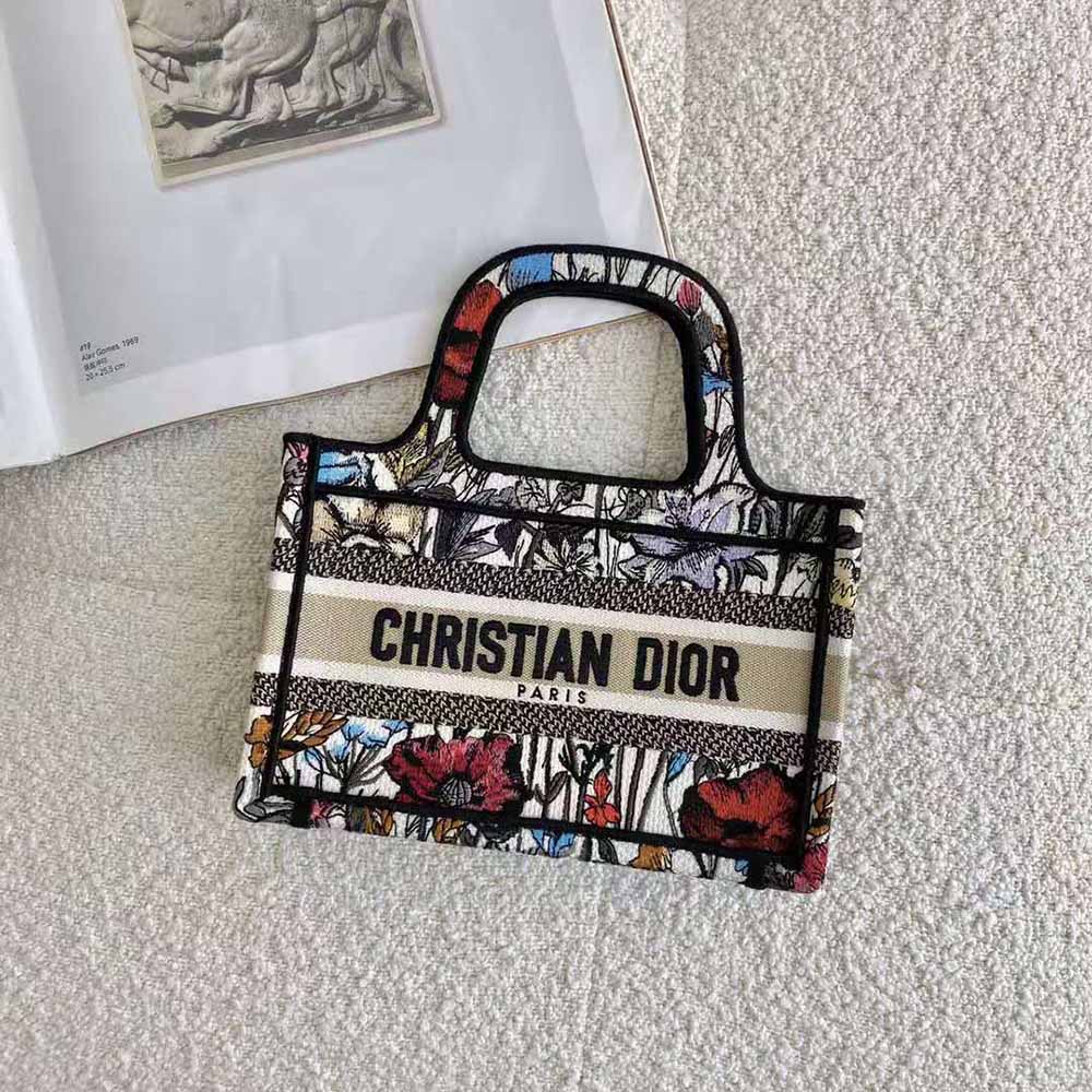 Close-up of Mille Fleurs embroidery on Dior Women Mini Dior Book Tote