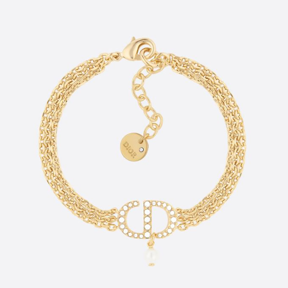 Close-up of Dior Women Multi-chain Petit CD Bracelet gold finish and crystals