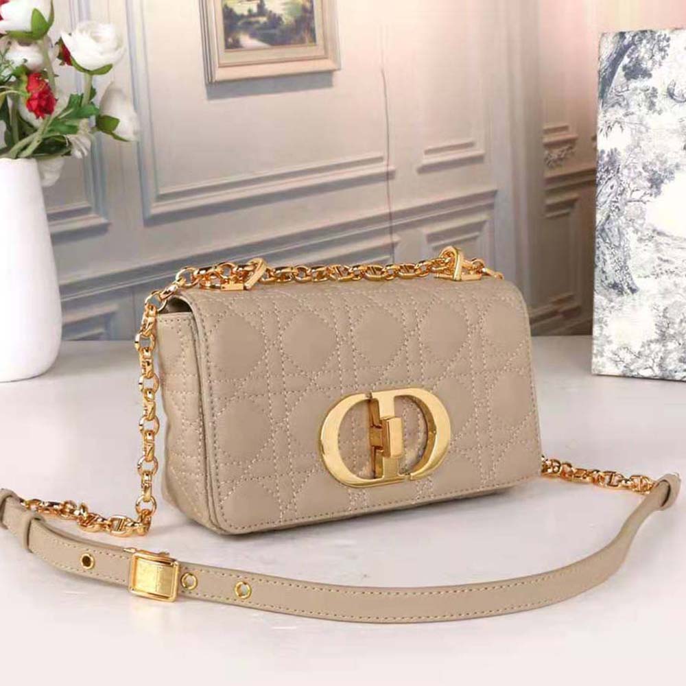 Side profile showing adjustable strap on Small Dior Caro Bag Beige by Dior