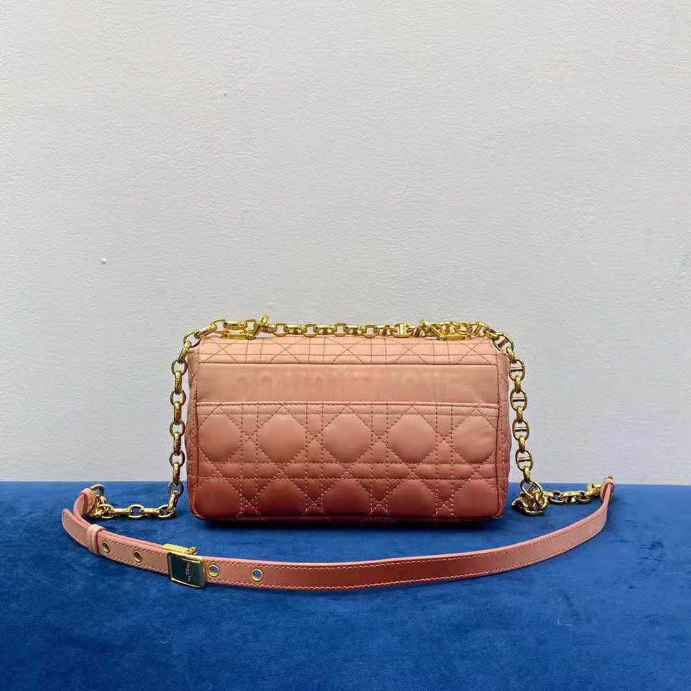 Side angle showing silhouette and shoulder strap of Dior Women Small Dior Caro Bag