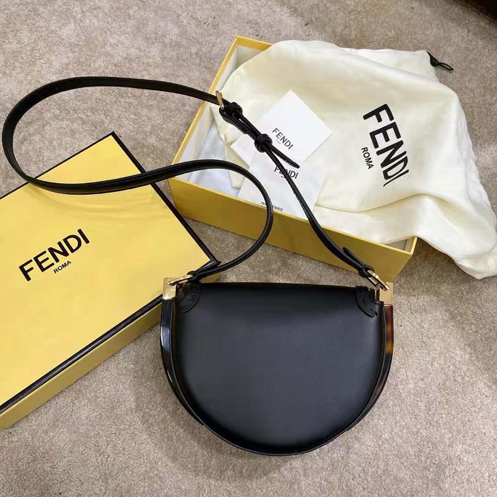 Side angle showing gold hardware on Fendi Moonlight Leather Satchel Bag