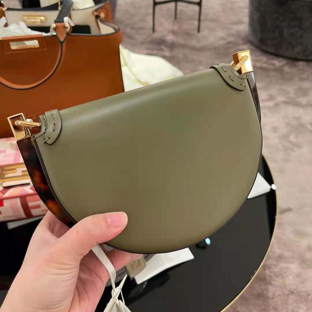 Side profile showing adjustable shoulder strap of Fendi Women Moonlight Leather Satchel Bag-Green