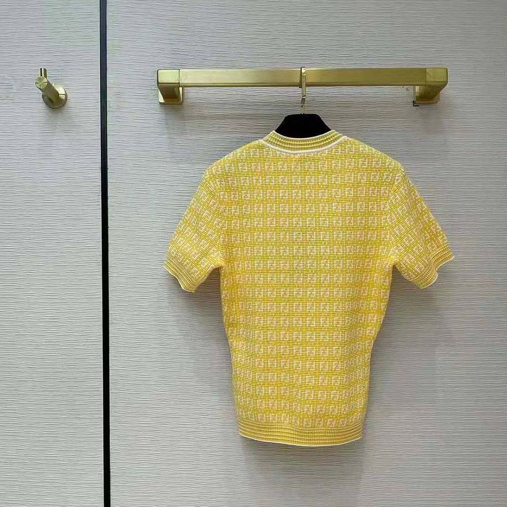 Side angle showing relaxed fit of Fendi Women Orange Viscose Sweater