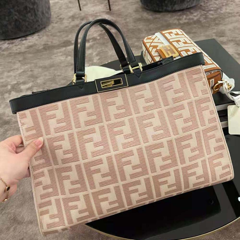 Close-up of embroidery and gold hardware on Fendi Peekaboo X-Tote bag