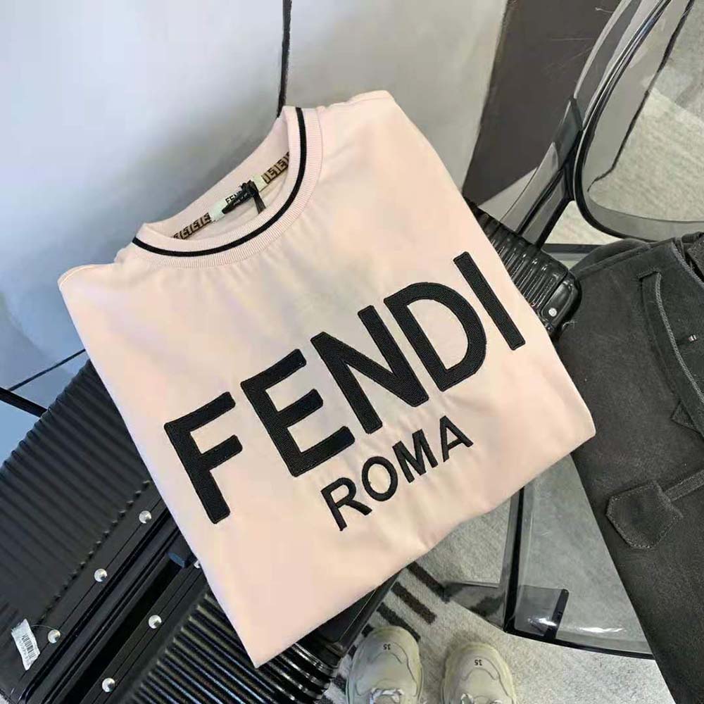 Close-up on Fendi logo detail of pink jersey T-shirt sleeve