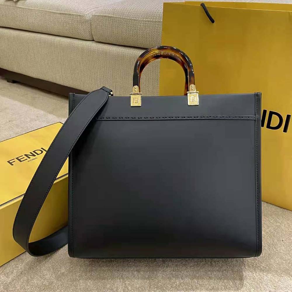 Side profile showing silhouette of Fendi Women Sunshine Medium Leather Shopper-Black