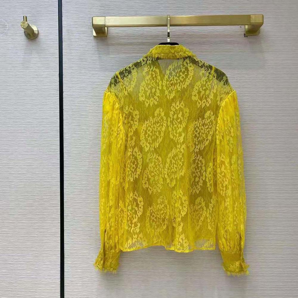 Back angle showing silhouette of Fendi Women Yellow Lace Shirt with Wide Puff Sleeves