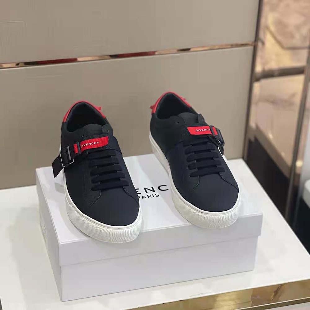 Close-up of black leather strap and embossed detail on Givenchy Men Sneakers