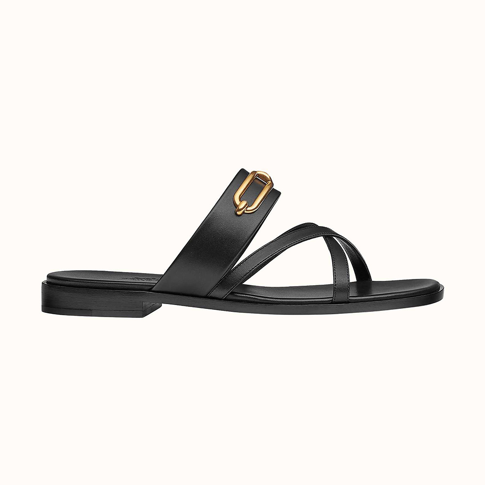 Side view of Hermes Women Claire Sandal in Calfskin Leather-Black