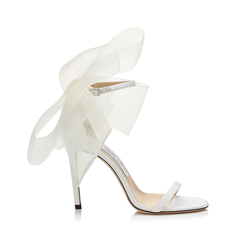 Side profile of Jimmy Choo Women Aveline 100 White Sandals with bow detail