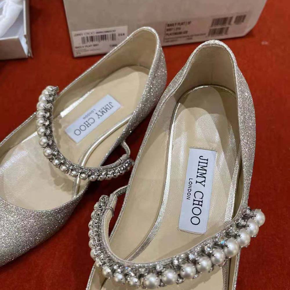 Top-down view showing glitter texture on Jimmy Choo Baily Flats