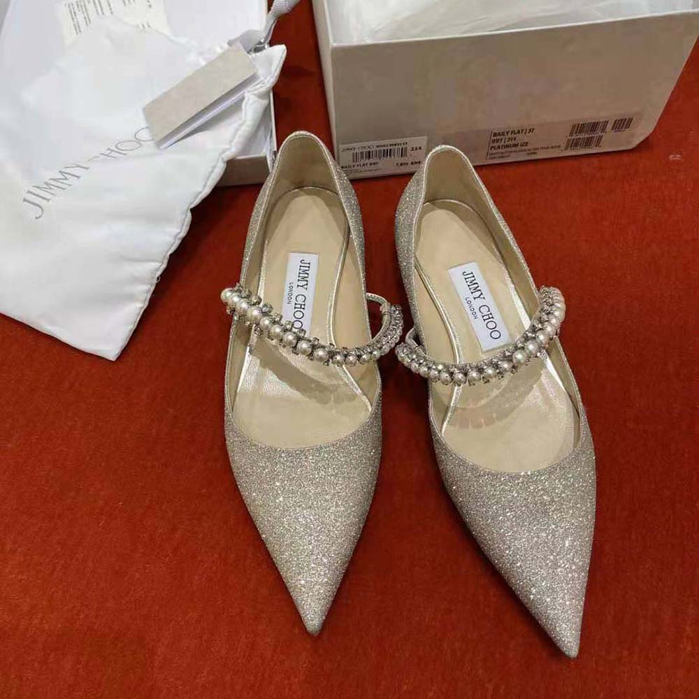 Close-up of crystal and pearl strap on Jimmy Choo Baily Flats