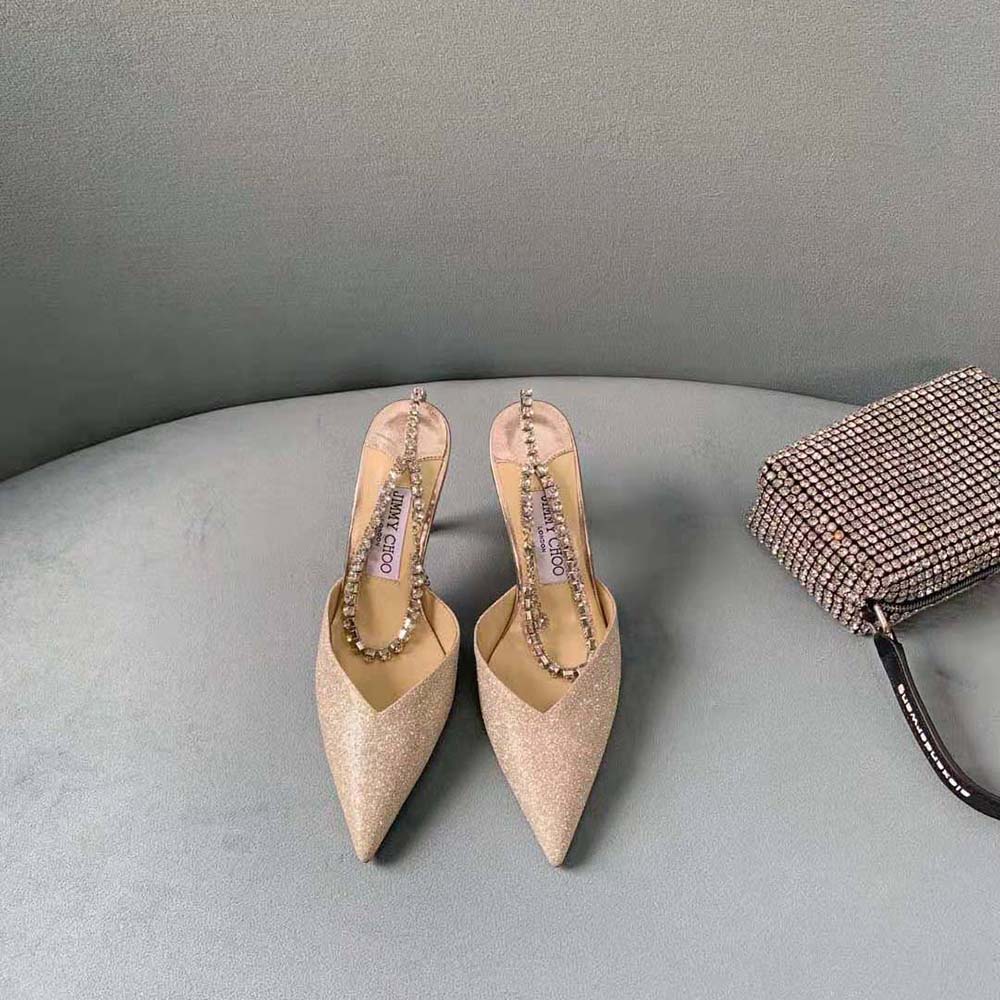 Top view showing ankle strap detail on Jimmy Choo Women Saeda Pumps