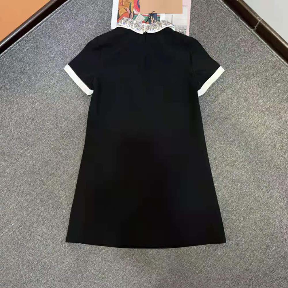 Side angle showing fitted silhouette of Miu Miu Women Cady Dress Precious Elegance Full of Contemporary Charm
