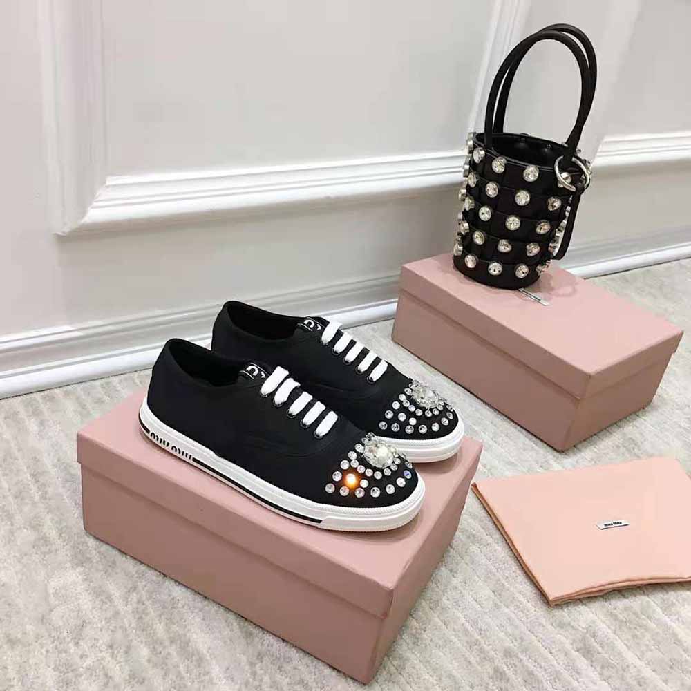 Close-up of black cotton gabardine fabric on Miu Miu Women Sneakers