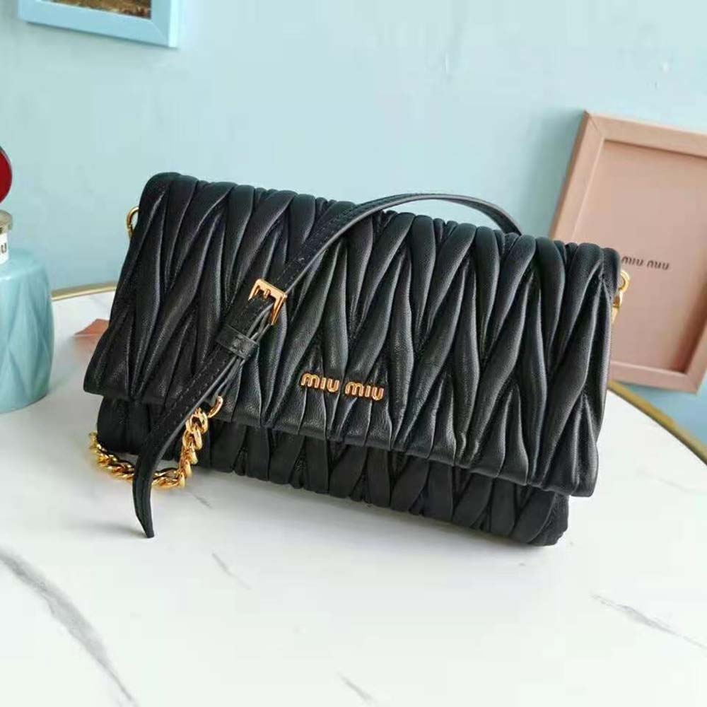 Close-up of silver-tone hardware and matelassé quilting on Miu Miu shoulder bag
