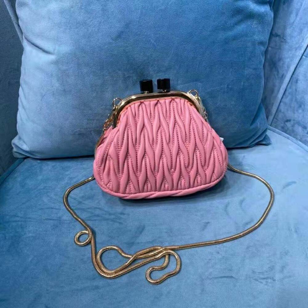Side angle showing pink nappa leather texture on Miu Miu Women Mini-Bag