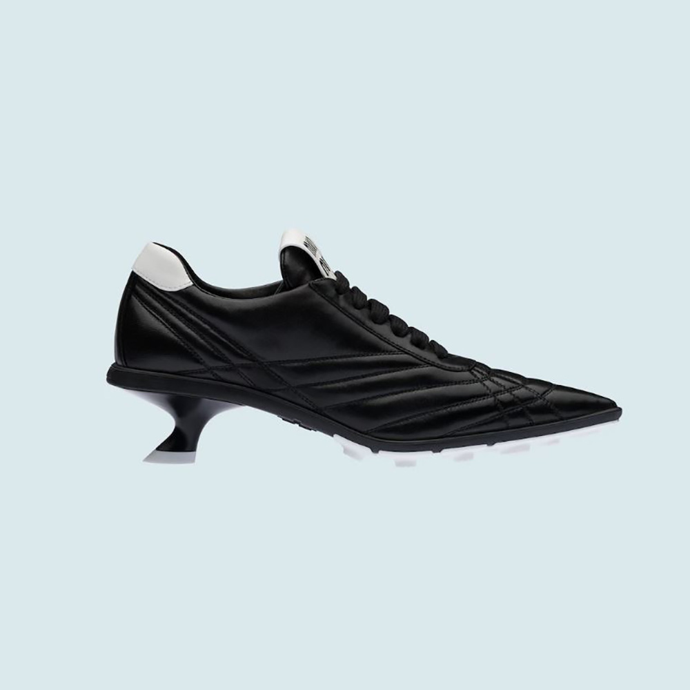 Side profile of Miu Miu Women Nappa Leather Mid-heel Sneakers-Black showing sleek silhouette