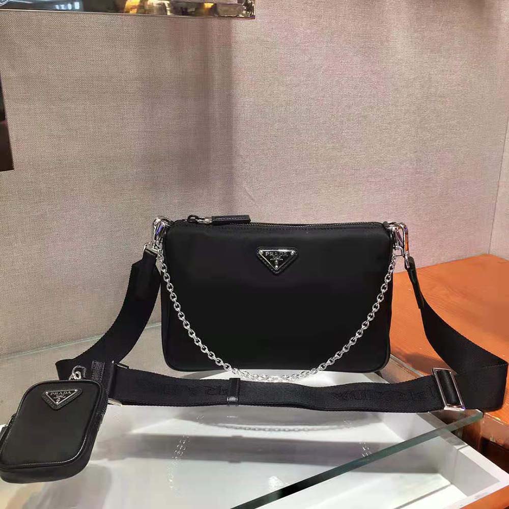 Close-up on saffiano leather detail of Prada Men Nylon and Saffiano Leather Bag with Strap-Black