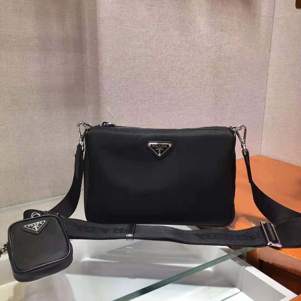 Side angle showing adjustable strap on Prada Men Nylon and Saffiano Leather Bag with Strap-Black