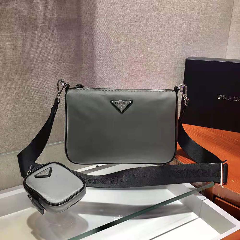 Close-up of silver-tone hardware on Prada Men Nylon and Saffiano Leather Bag