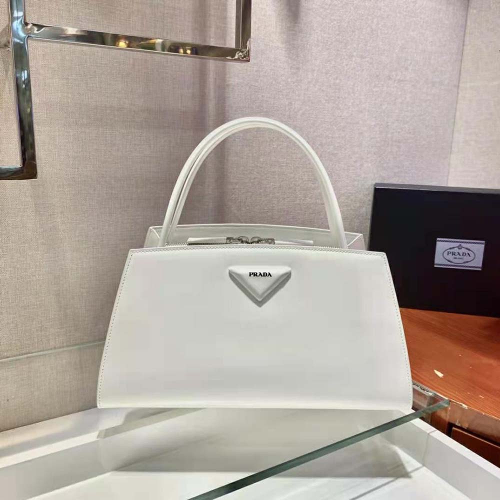 Side angle showing silhouette of Prada Women Brushed Leather Handbag-White