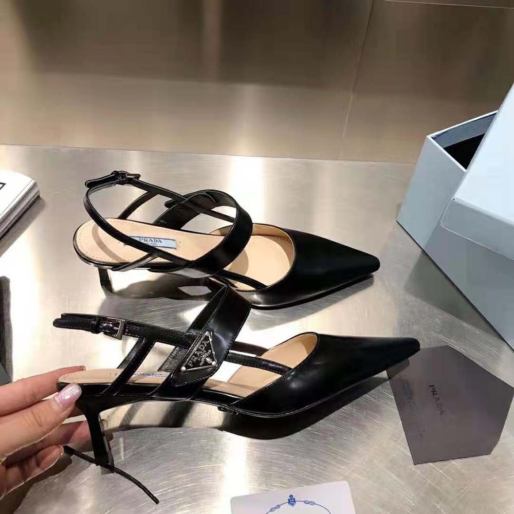 Close-up on black brushed leather and Prada hardware detail