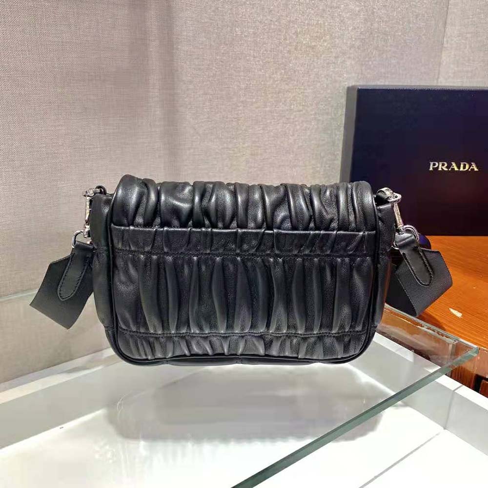 Side angle showing adjustable strap on Prada Women Gaufre Nappa Leather Shoulder Bag-Black
