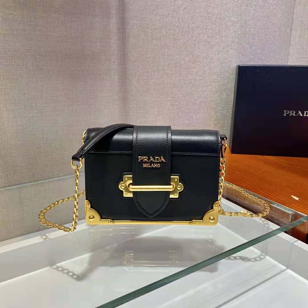 Close-up of gold-tone hardware on Prada Women Leather Prada Cahier Bag-Black