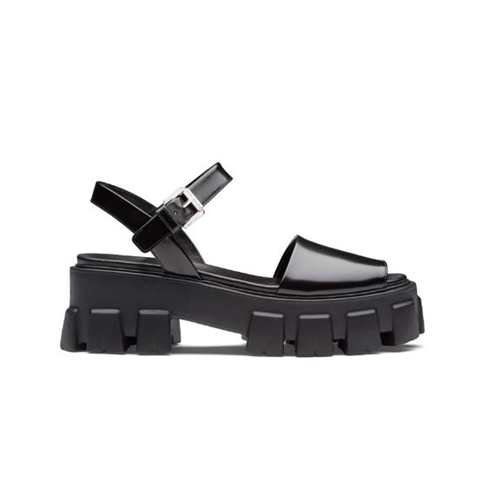 Side view of Prada Women Monolith Brushed Leather Sandals in Black 55mm heel
