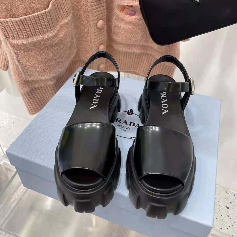 Top view showing adjustable buckle and sleek silhouette of Prada Women Monolith Sandals