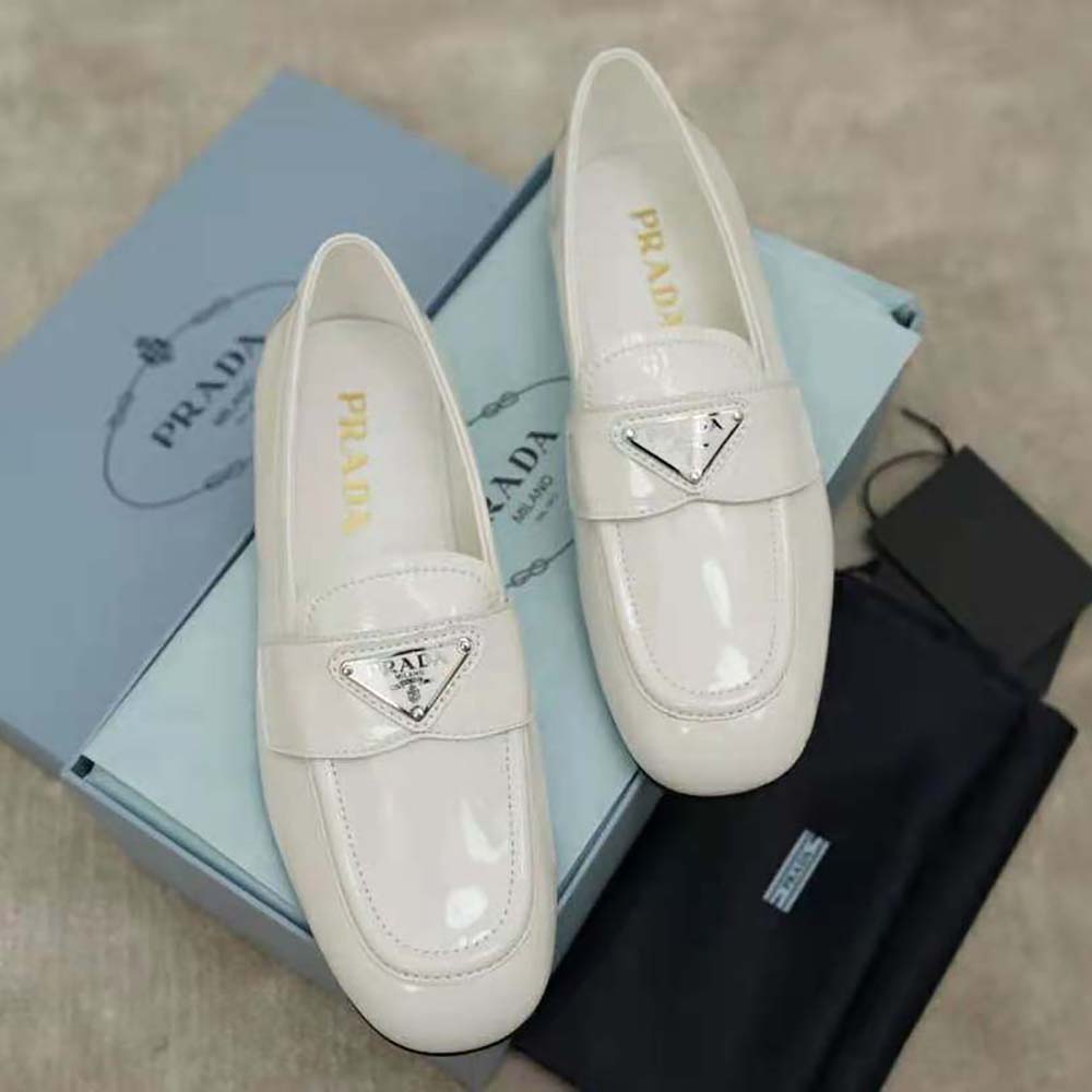 Top angle showing signature detailing on Prada Women Patent Leather Loafers