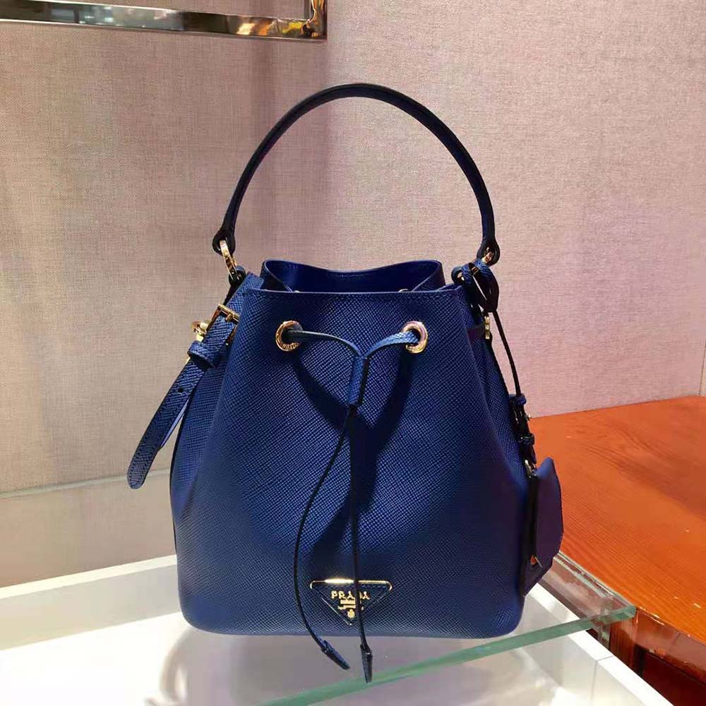 Close-up of polished silver hardware on Prada Women Saffiano Leather Bucket Bag-Navy