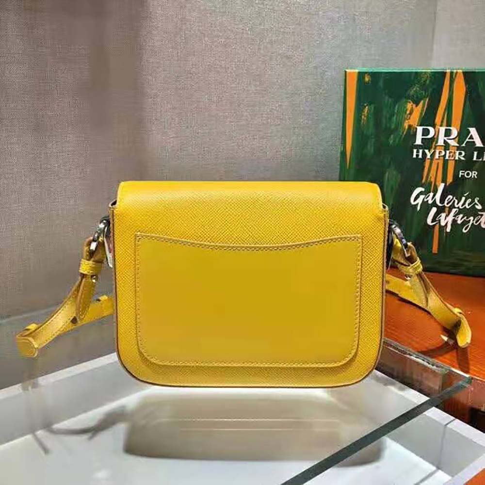 Side angle showing structured silhouette and adjustable strap detail