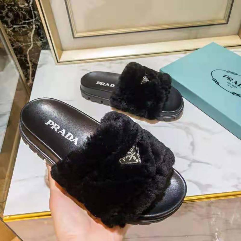 Top detail of plush shearling lining on Prada Women Shearling Slides