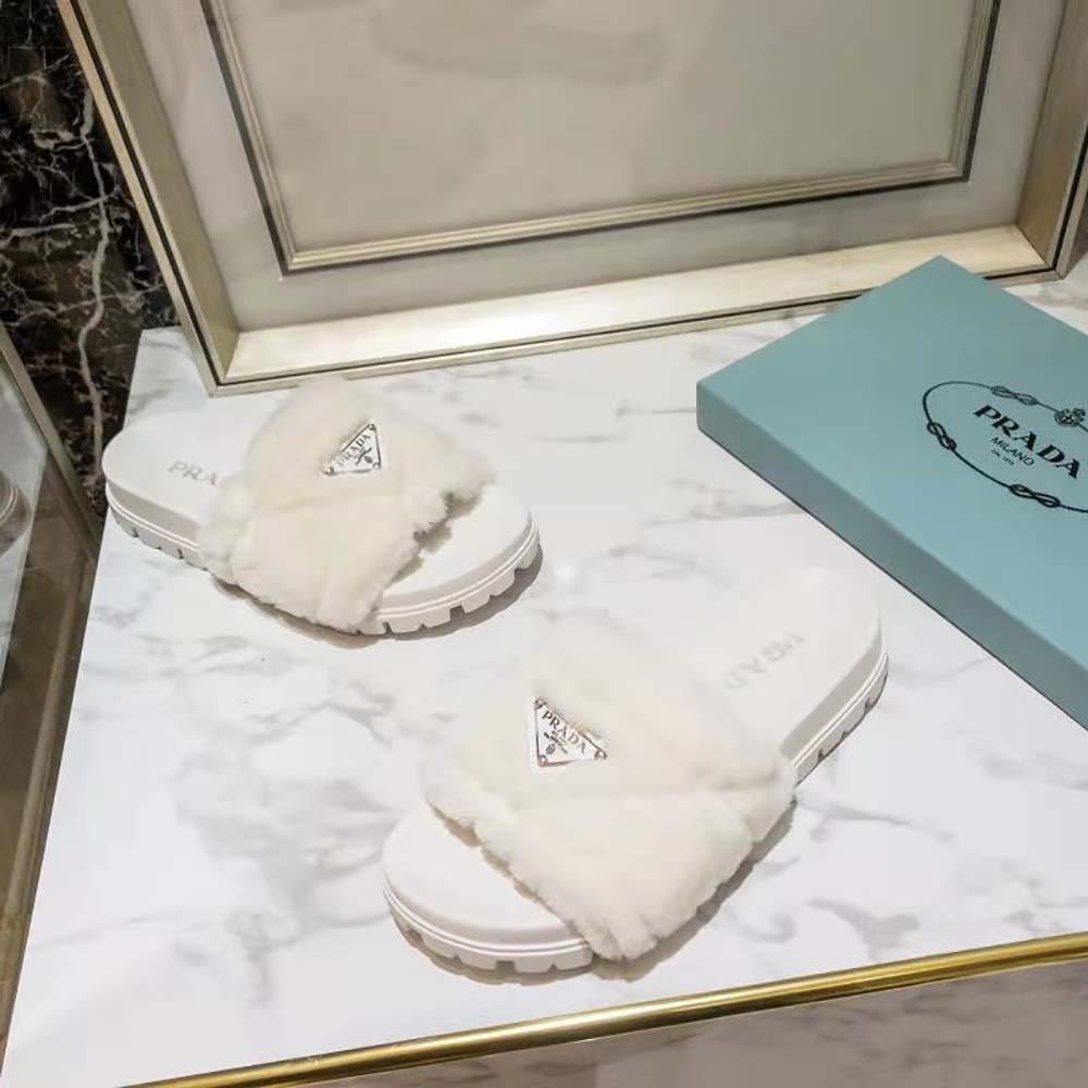 Top-down view showing open toe of Prada Women Shearling Slides in white