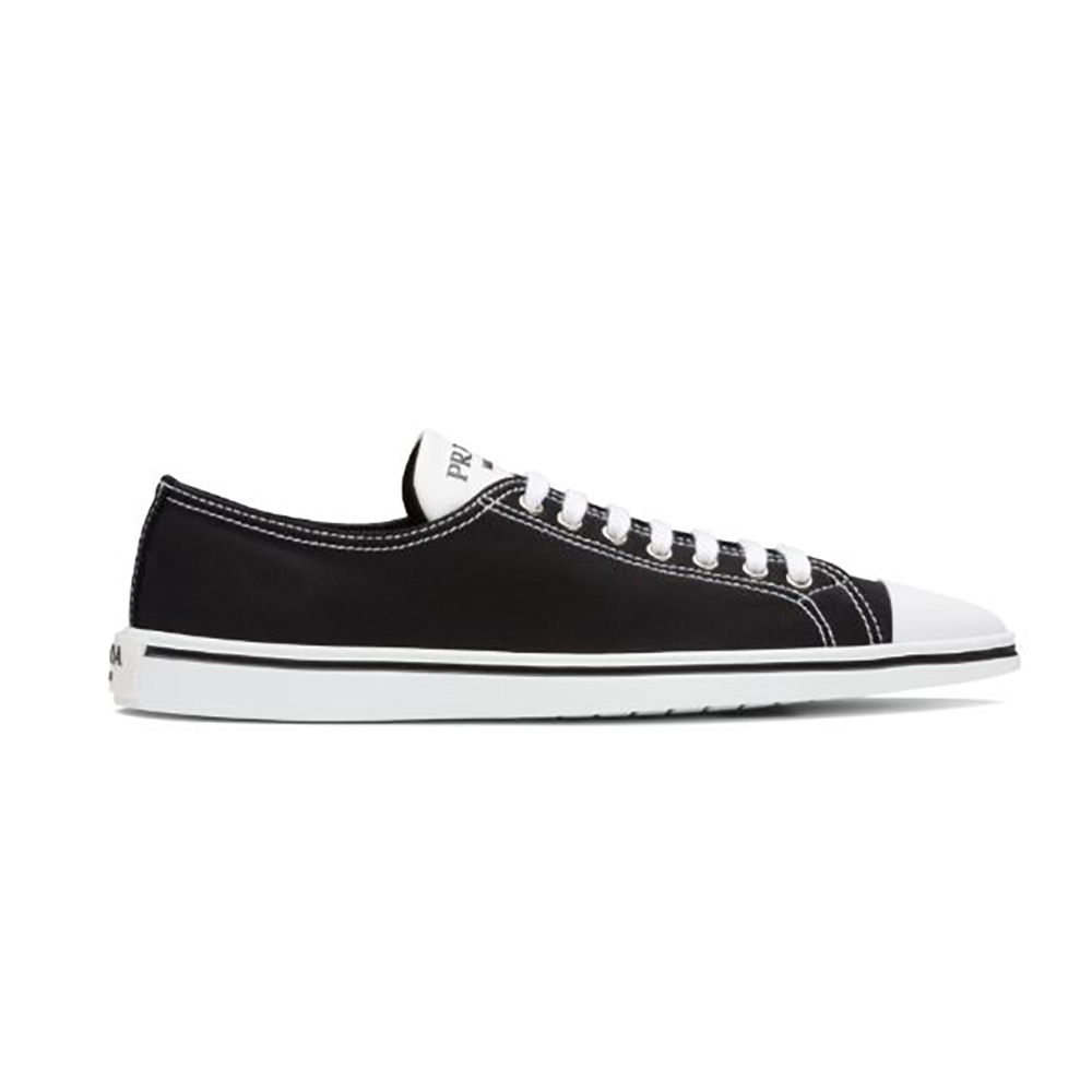 Side angle of Prada Women Synthesis Sneakers in 25mm Heel-Black showing heel shape