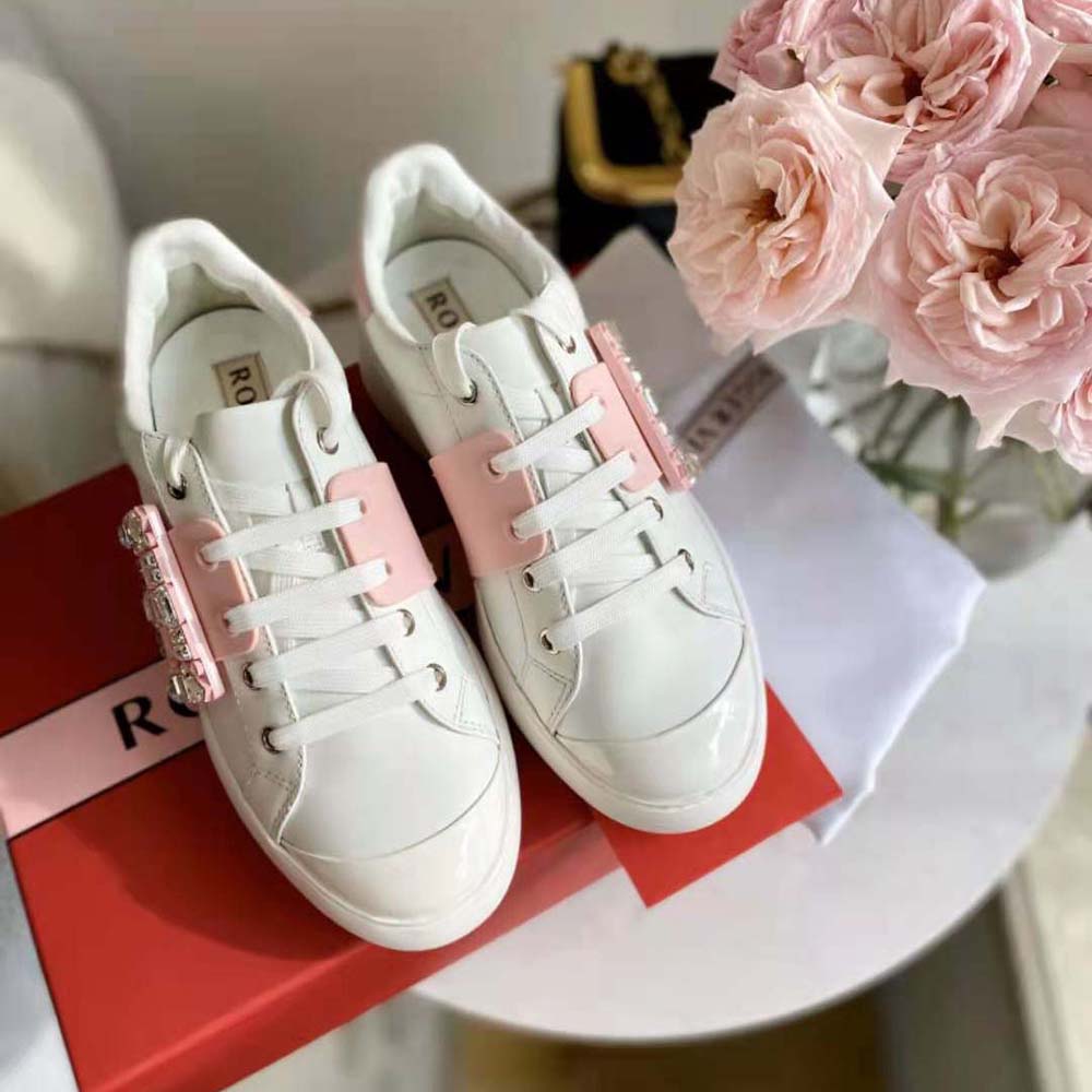 Top angle showing lace-up and leather texture on Roger Vivier sneakers