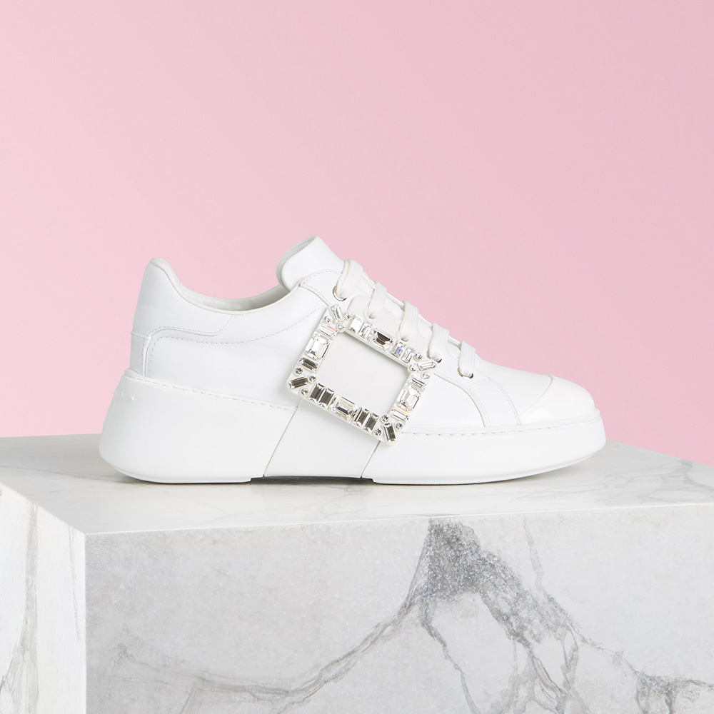 Side view of Roger Vivier Women Viv Skate Strass Buckle Sneakers in Soft Leather-White